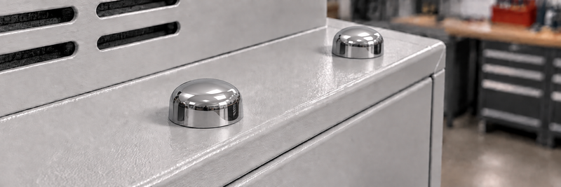Polished chrome Hex-Caps bolt covers on equipment enclosure hardware